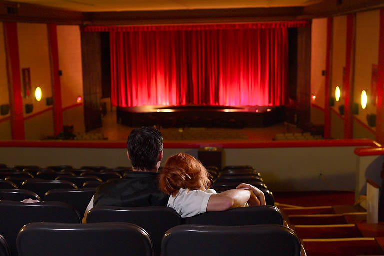 Couple Enjoying Custom Home Theater